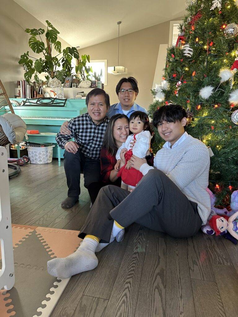 family picture of the owners of Tidy House with their children